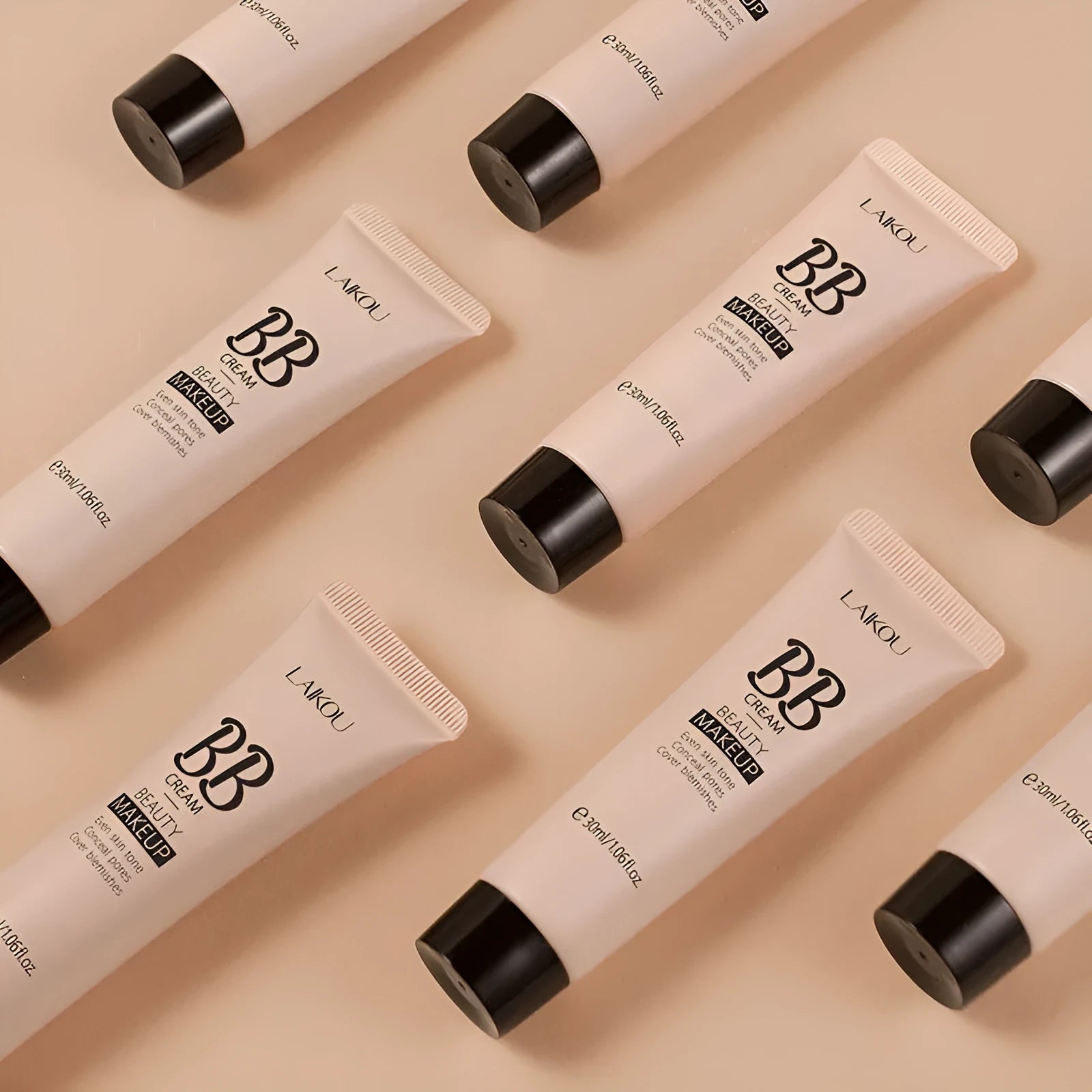 30ml tube of natural BB cream showing nine available shade colours from light to dark