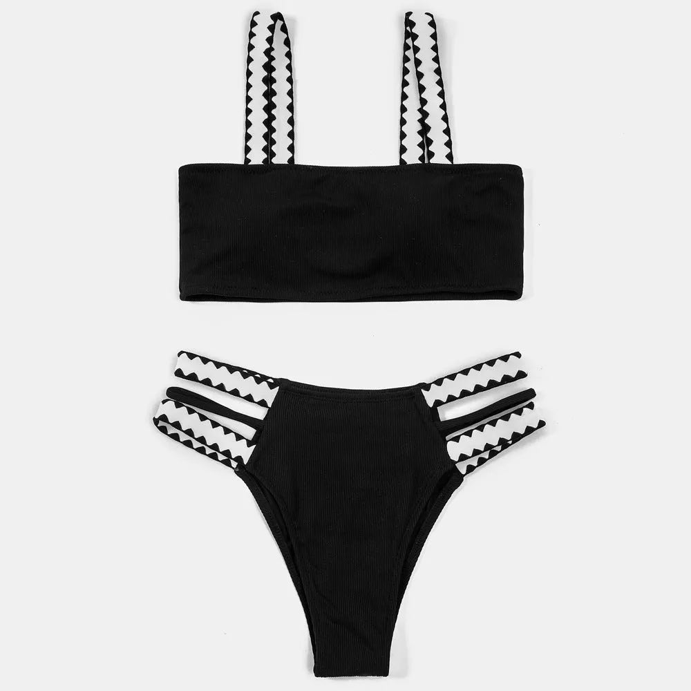 Black hollowed-out split briefs swimsuit for women made from polyester fabric