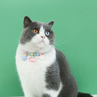 Adjustable resin pet collar with macaron designs in six colours, showing sizing from 15-38cm
