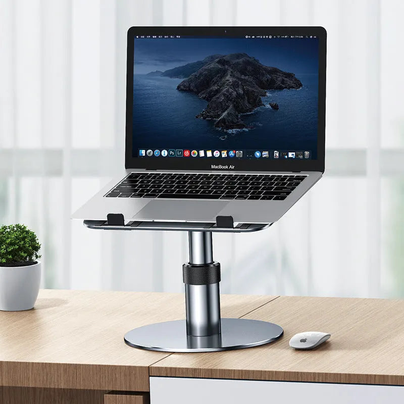 Silver adjustable aluminium car laptop stand with rotating base shown holding a laptop
