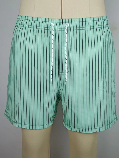 Pair of grey striped polyester shorts with a straight leg cut on a mannequin
