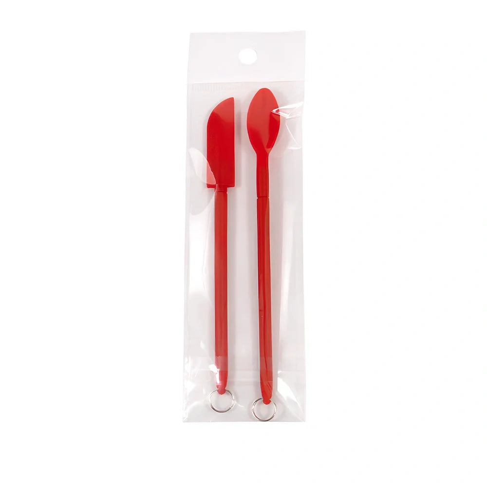 Retractable silicone cosmetic spatula extended to 15cm with scraper tool for product application