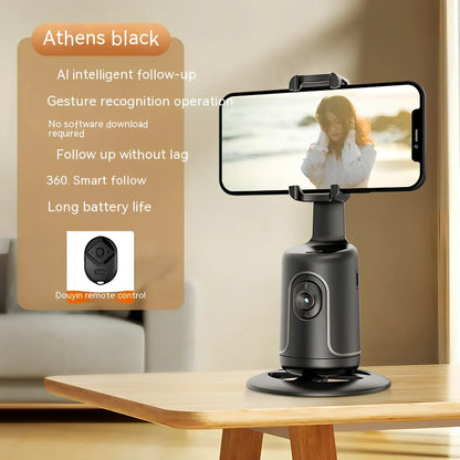 Automatic tracking stabilizer in black with 360 degree rotation on desk, USB connected, 175.2 x 54.8 x 57mm size