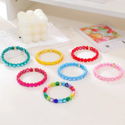 Rainbow enamel heart-shaped stretch bracelet in alloy with diamond process surface