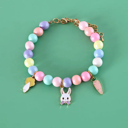 Adjustable resin pet collar with macaron designs in six colours, showing sizing from 15-38cm