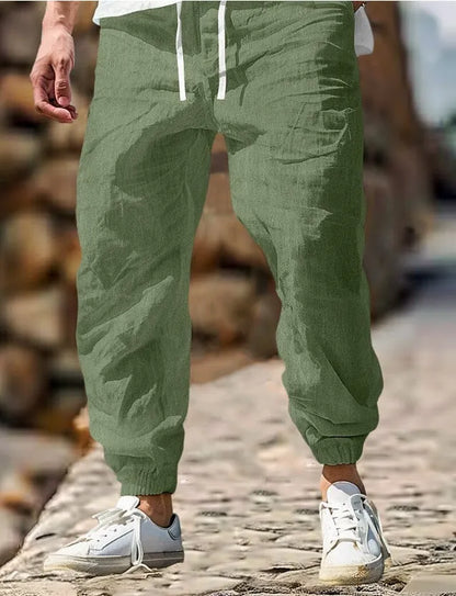 Men's straight-leg cotton trousers with elastic waist in Army Green colour, showing front and back views.