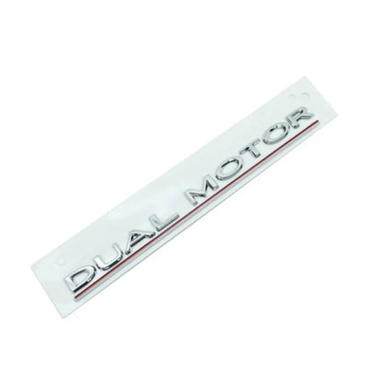 Model 3 car bumper sticker measuring 19cm by 3cm in ABS plastic with matte black and red stripe design