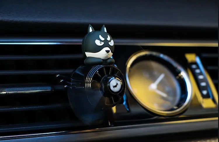 Set of four animal-themed car air vent clip ornaments: black husky, black cat, pink cat, and pink duck.