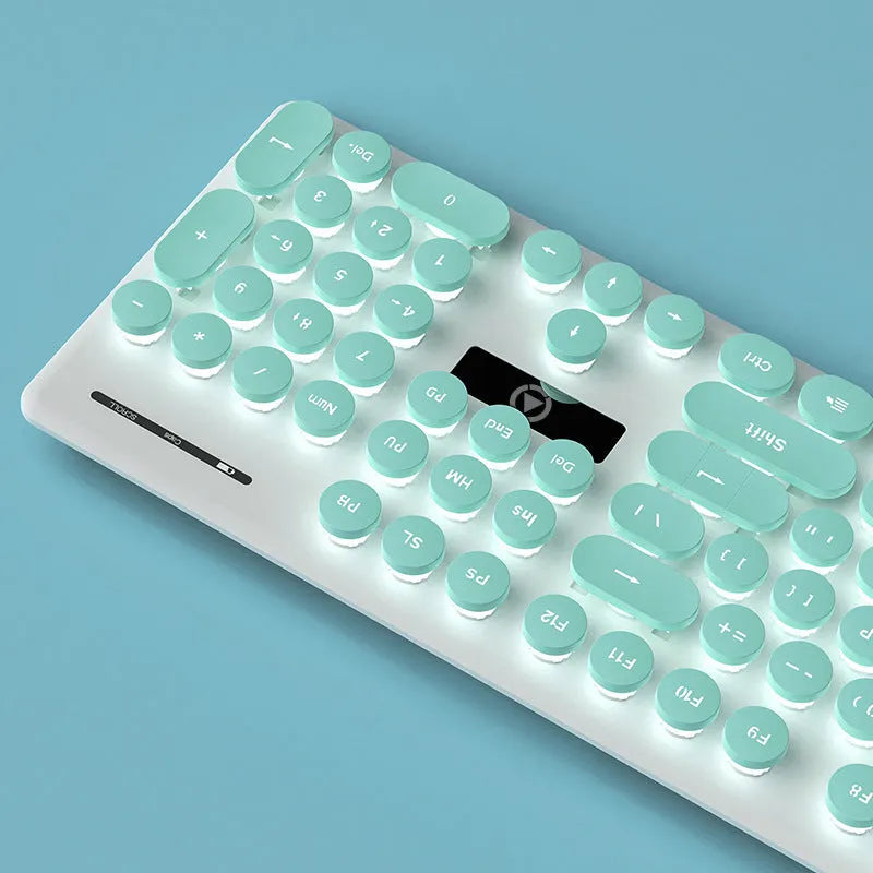 Punk mechanical feel keyboard with backlight in mint green, pink, or black blue light colours, measuring 44cm wide