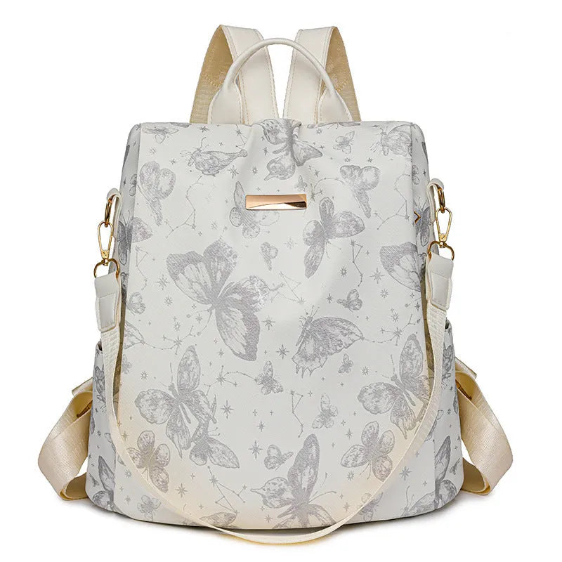 Butterfly printed large capacity PU backpack in various colours with sewing line details and an ergonomic back.