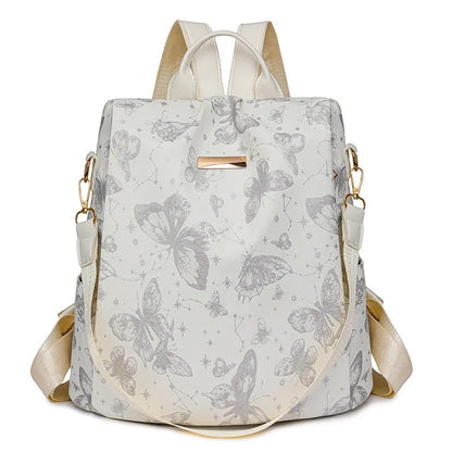 Butterfly printed large capacity PU backpack in various colours with sewing line details and an ergonomic back.