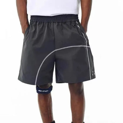 Men's dark grey drawstring shorts with an elastic waistband and loose fit for summer.