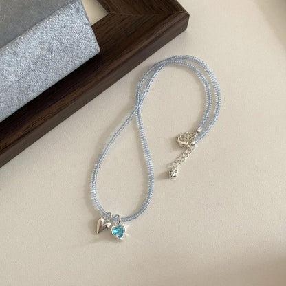 Women's colourful beaded hollow flower necklace in Korean style with copper chain.