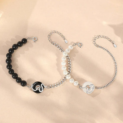 925 sterling silver couple's bracelet with obsidian pearl and snake detail in New Chinese style.