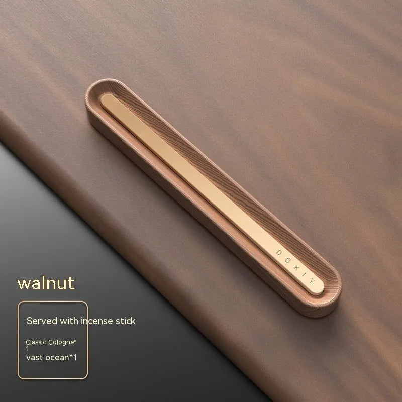 Car vent clip aromatherapy ornament in walnut or metallic grey with long strip design