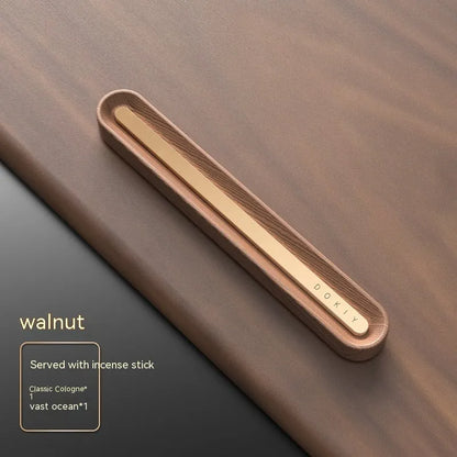 Car vent clip aromatherapy ornament in walnut or metallic grey with long strip design
