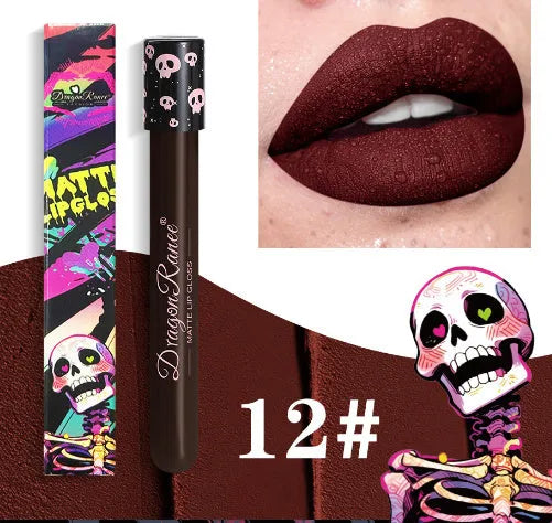 Halloween skull test tube lip gloss in gold and silver matte metallic shades showing doe-foot applicator.