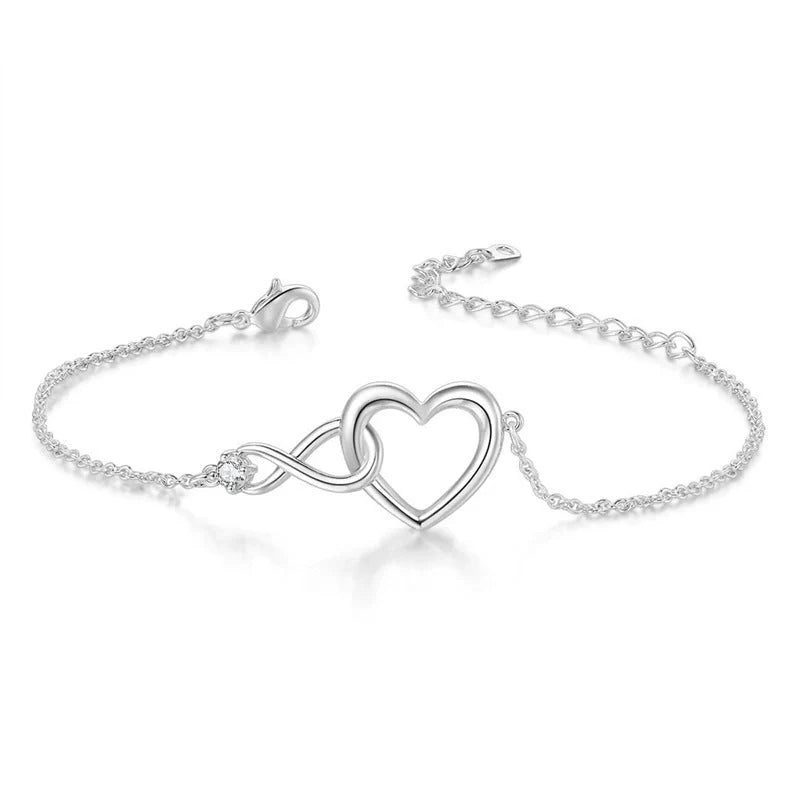 Heart-shaped bracelet with 3A zirconia in platinum and golden colors