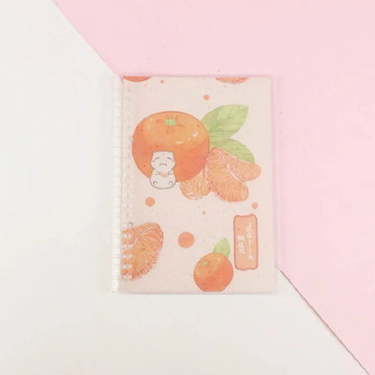 Hard cover A5 and B5 notebook with animal painting designs like whales and fruit, showing coil binding.