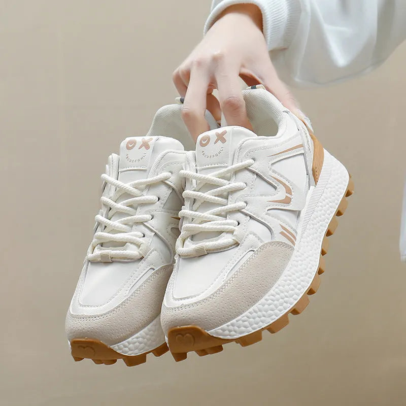 Women's solid colour platform sports casual shoes with flat heel and front lace-up.