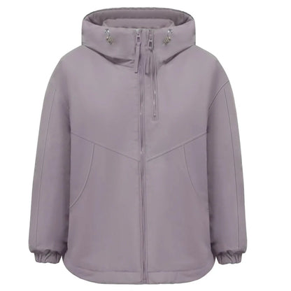 Women's grey hooded shell jacket with loose fit and long sleeves on hanger