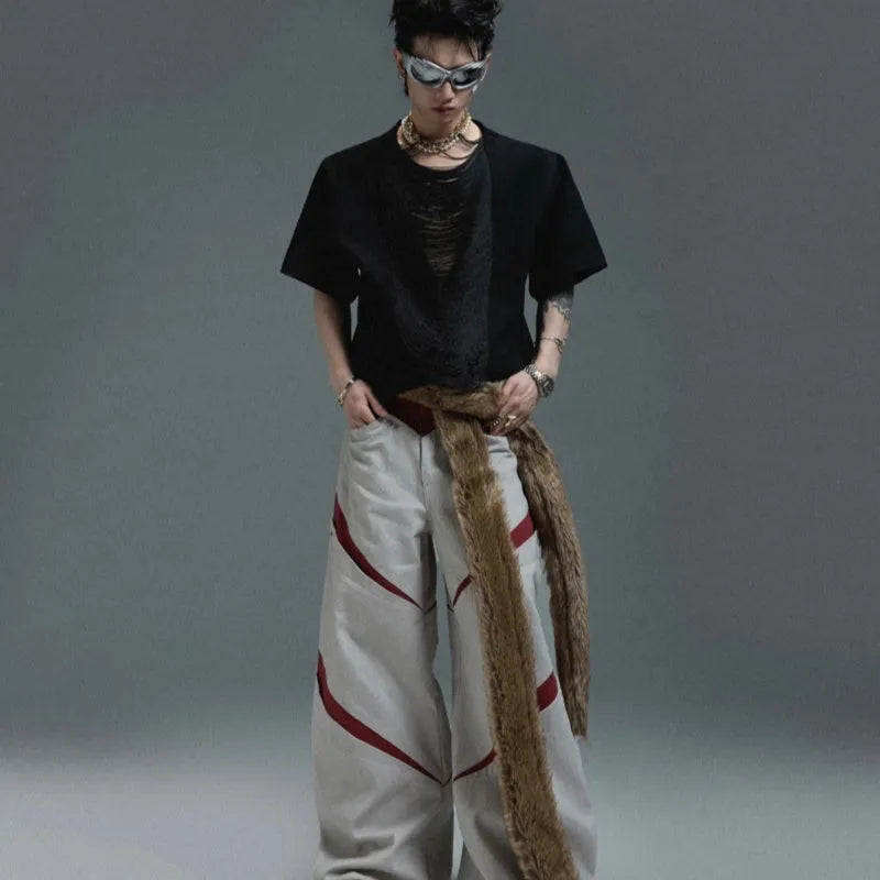 Men's loose fit black t-shirt with a hollow-out V-neck collar and tassel detail on short sleeves.
