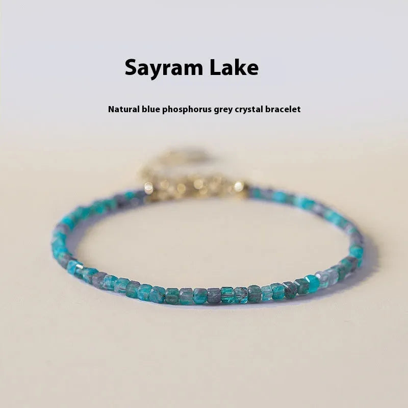 Women's crystal bracelet featuring natural blue apatite stones in diamond-cut shapes, designed for wrist sizes 14cm to 18cm, presented with blue and grey colour tones suitable for casual or accessory wear