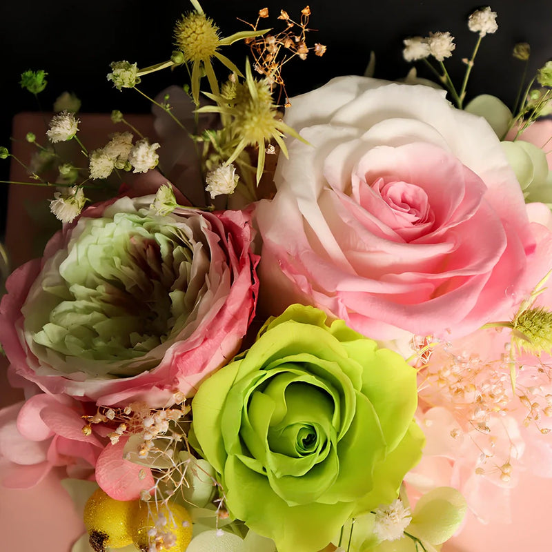 Preserved flower gift box featuring eternal roses and carnations with hydrangea accents, providing long-lasting floral arrangements that maintain their appearance for years without water or maintenance
