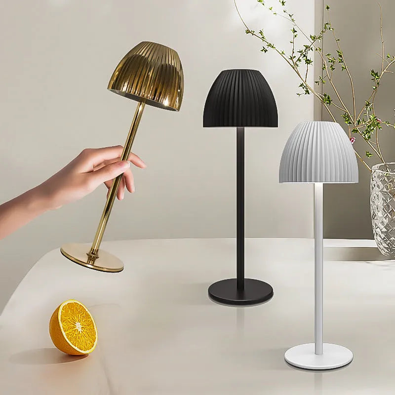 USB rechargeable night lamp with dimming pattern display in black thin round base design