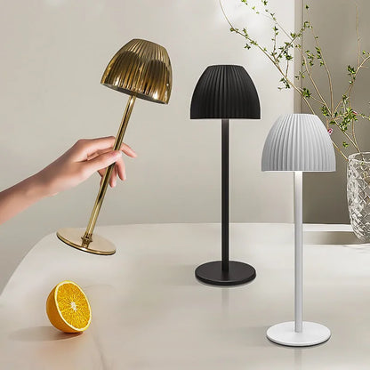 USB rechargeable night lamp with dimming pattern display in black thin round base design