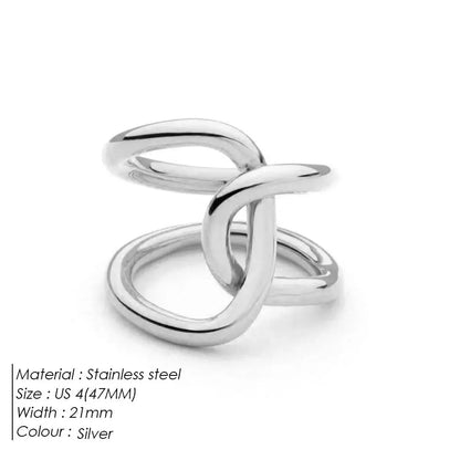 Knotted adjustable stainless steel ring for women in gold or steel colour on a grey background.