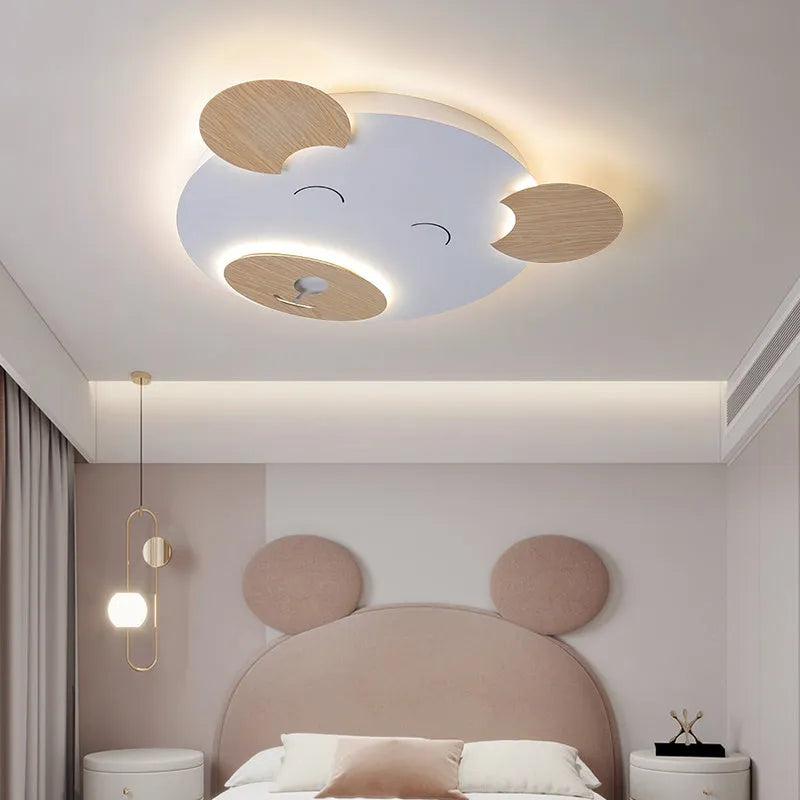 Cartoon bear shaped ceiling lamp with wrought iron frame for a princess themed room.