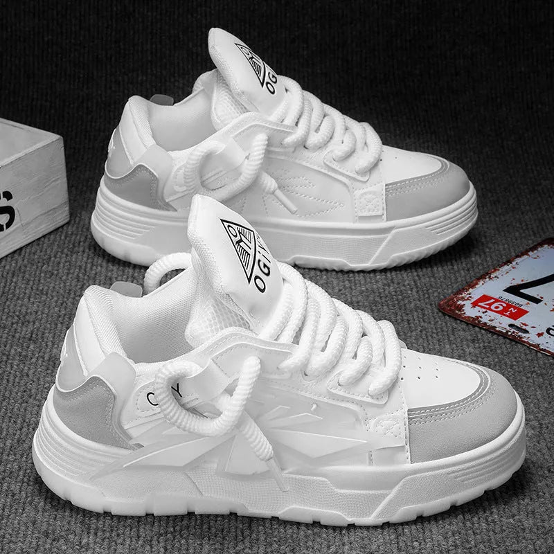 Men's white clunky sneakers with cartoon totem patterns, low-top design, and rubber soles for casual leisure wear