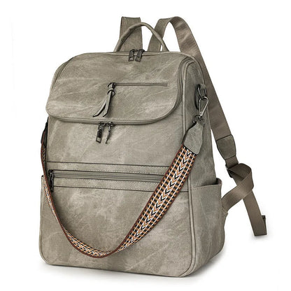 Retro college student backpack with curved shoulder straps in multiple colour options including black, blue, and yellow apricot