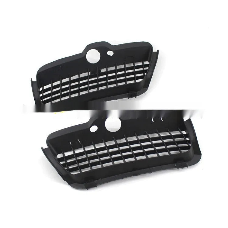 Pair of black ABS plastic Volkswagen Golf 3 fog lamp covers for front bumper.