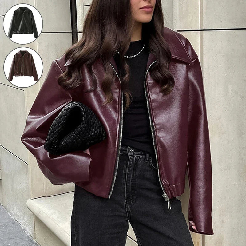 Stylish faux leather jacket with zip-up closure and lapel collar, available in burgundy and black colors
