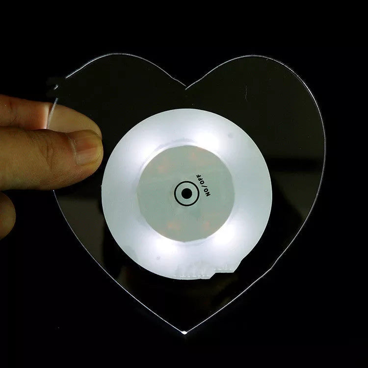 LED Glow Coaster with vibrant colors illuminating a cocktail glass