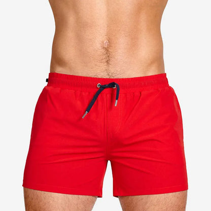 Athletic sports shorts in Army Green colour with visible mesh lining and elastic waistband with drawcord.