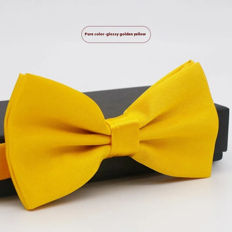 Flat-head self-tie bow tie in a wine red colour, showing its 12cm width and 6cm height dimensions.