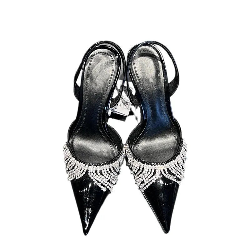 Black women's slingback high heel sandals with pointed toe, 10cm heel, and French tassel rhinestone decoration.
