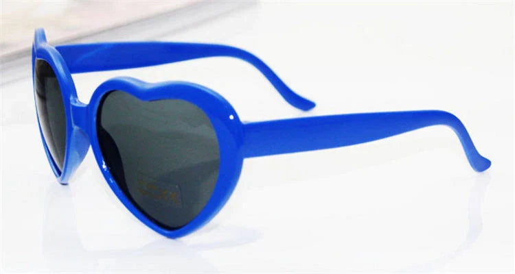 Stylish heart-shaped lighting sunglasses with a plastic frame and resin lenses, creating a mesmerizing effect for romantic occasions