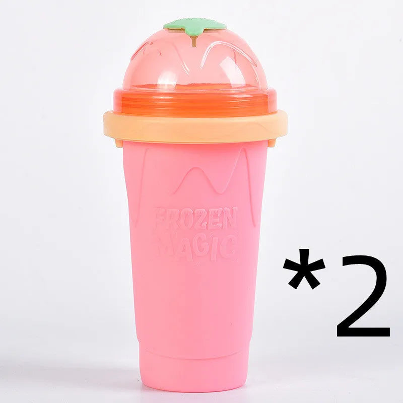 Silicone quick-freeze slush maker cup in mint green with lid and straw spoon