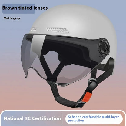 3C certified electric motorcycle helmet in polypropylene with sun visor, shown in Ice Crystal Gray colour option