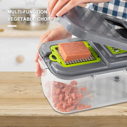 Grey multi-function vegetable cutter with stainless steel blades and foldable compartment design measuring 26cm