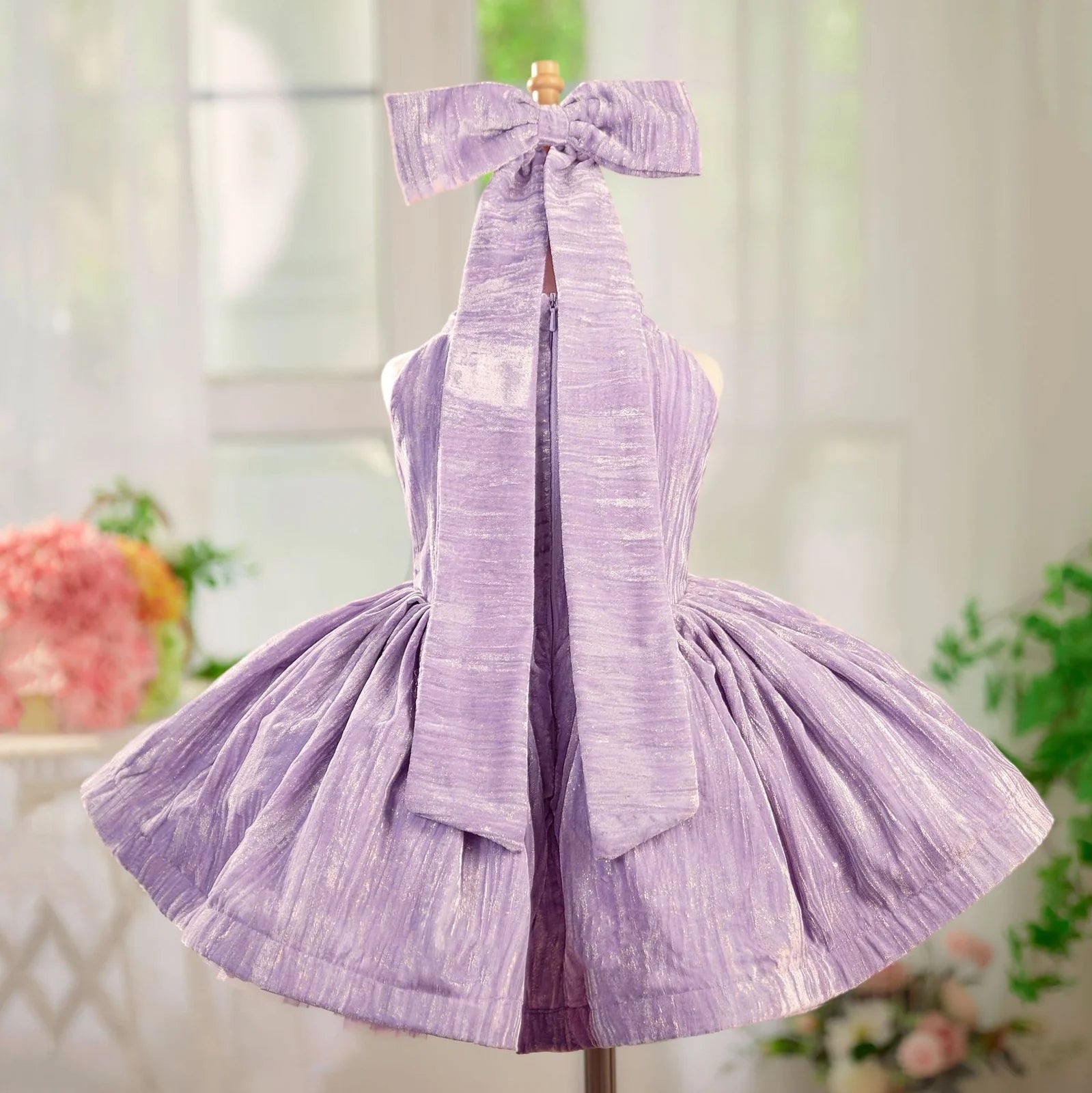 Girls' dreamy purple velvet princess dress showing princess silhouette and velvet texture