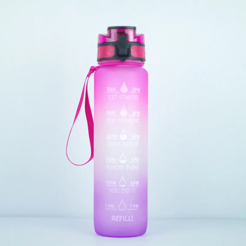 Transparent 1000ml Tritan sports water bottle with infuser on a plain background