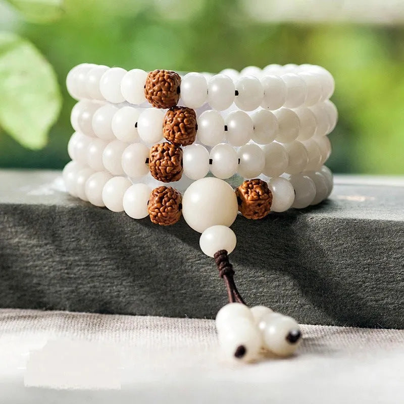 A long white jade Bodhi bead bracelet with 6x8mm beads, shown in various style options including cloisonne and lotus designs.