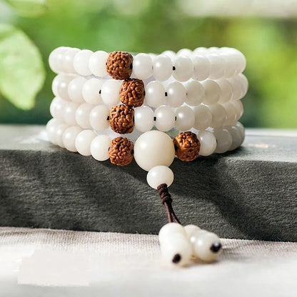 A long white jade Bodhi bead bracelet with 6x8mm beads, shown in various style options including cloisonne and lotus designs.
