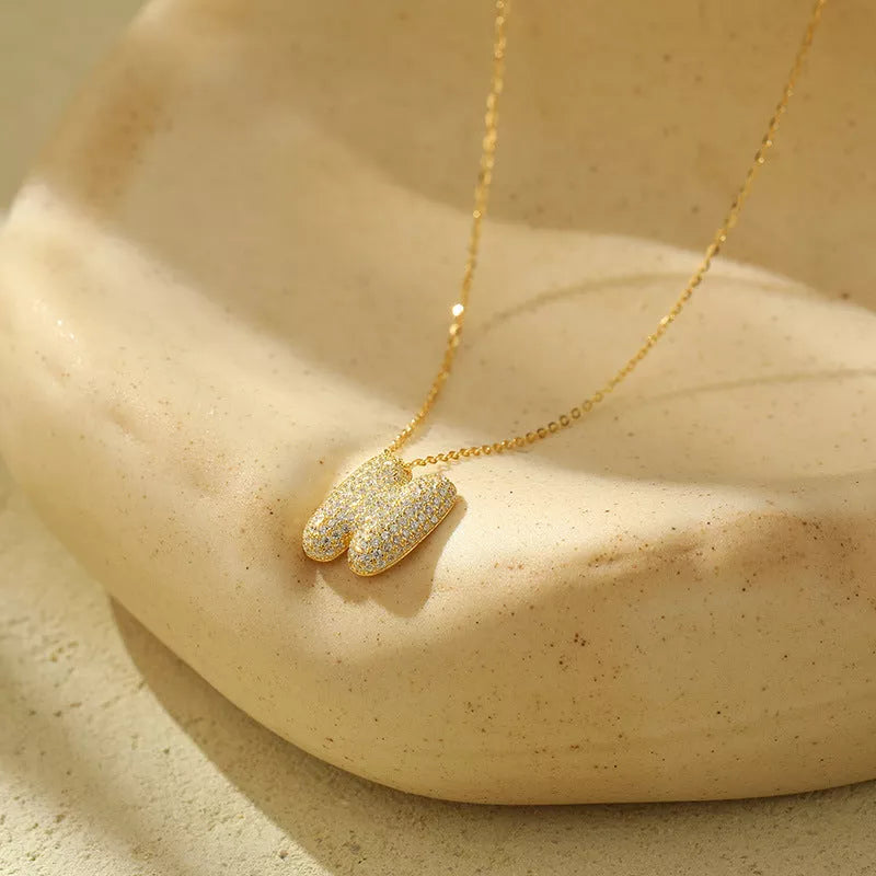 Stainless steel initial pendant necklace with zircon accents, personalized with your choice of letter.