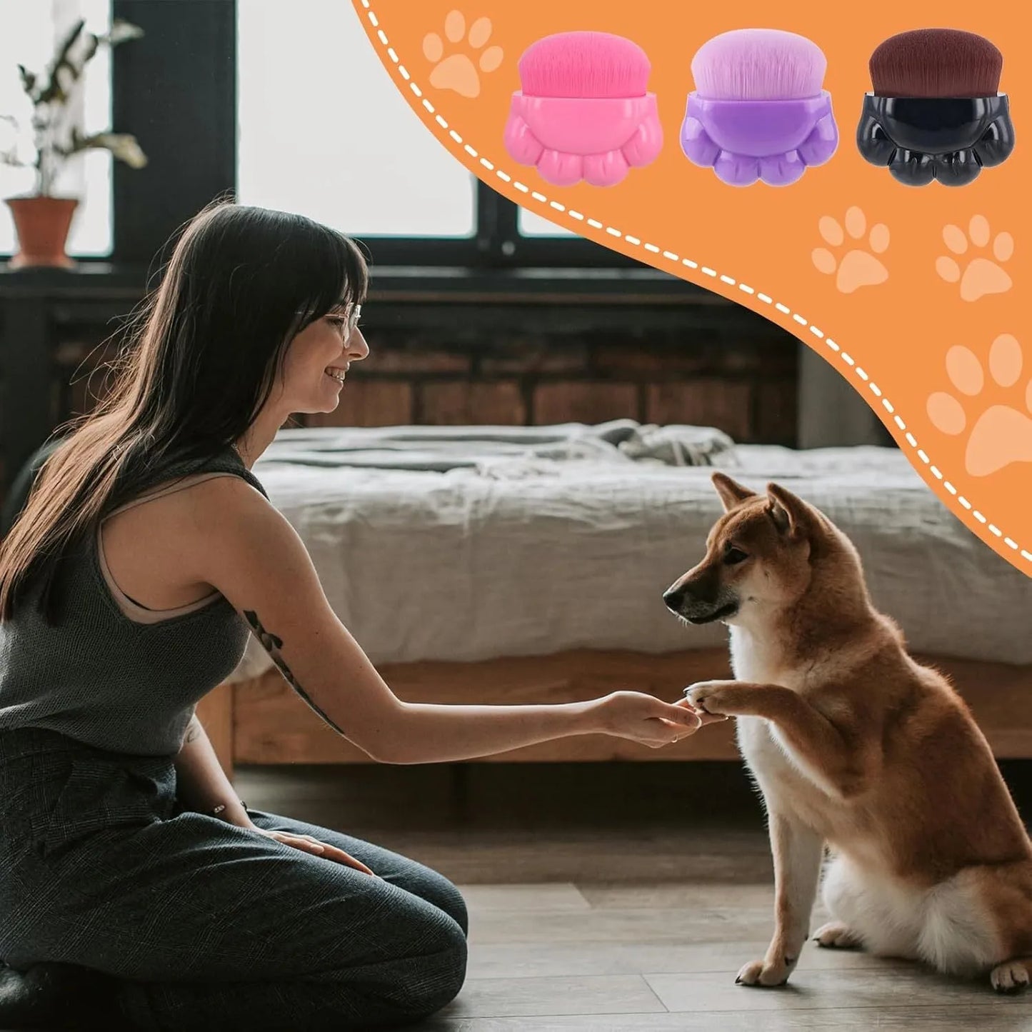 Three small paw-print shaped pet balm brushes with soft heads in plastic storage boxes